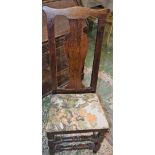 An 18th century oak backstool, shaped cresting, vasular splat, drop-in seat, turned stretchers,