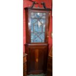 A 19th century parcel-gilt mahogany and marquetry floor standing corner display cabinet,