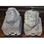 A pair of Medieval limestone figural architectural corbels, each carved with the head of a man,