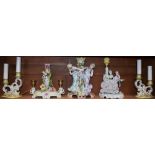 A pair of Continental ceramic table lamps, in the form of ornate candelabra, floral decoration,