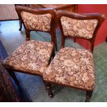 A set of six William IV mahogany dining chairs, incurved rectangular backs, stuffed over upholstery,