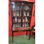 A 19th century mahogany library bookcase on stand,