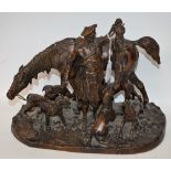 A dark patinated bronze, of a Scottish hunting scene, horse and hounds, signed in the maquette P.J.