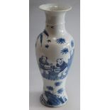 A Chinese slender baluster vase, painted in underglaze blue with a lady and attendants in a garden,