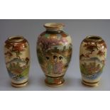 A pair of Japanese Satsuma vases, decorated with river and bridge landscape,