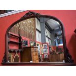 A Victorian style mahogany overmantel mirror, crested and bracketed by scrolling acanthus,