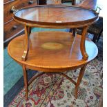 An Edwardian satinwood crossbanded mahogany oval tray top etagere,