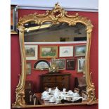 A 19th century Rococo Revival pier glass, leafy scroll cresting and frame,