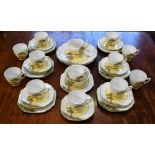 A Victoria China Landscape Garden design pattern part tea set, comprising cups, saucers,