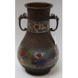 A late 19th century Chinese champlevé enamel and brown-patinated bronze baluster vase,