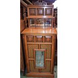 An Aesthetic Movement walnut side cabinet, in the manner of Bruce Talbert (1838-1881),