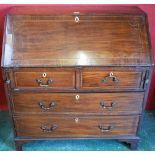 A George III mahogany bureau,