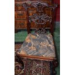 A Chippendale design mahogany side chair, the back with shaped cresting rail,