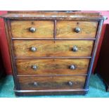 An early Victorian mahogany chest, caddy top above two short and three long graduated drawers,