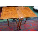 A Victorian burr walnut rounded rectangular Sutherland table,