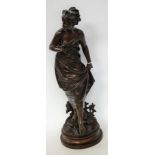 Eutrope Bouret, French (1833 - 1906), a dark patinated bronze, Crossing the Stream,