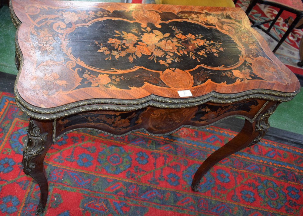 A Louis XV Revival gilt metal mounted kingwood and marquetry shaped serpentine card table,