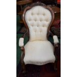 A Victorian walnut armchair, shaped spoon back, scroll arms,