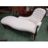 A Victorian mahogany chaise lounge, bowed cresting rail applied with scrolling acanthus,