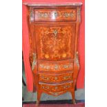 A French Louis XV Revival gilt metal mounted mahogany and marquetry bombe shaped secretaire a