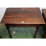 An 18th century oak side table, moulded rectangular top above a deep frieze,