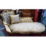 A Victorian design giltwood chaise lounge, stuffed over upholstery,