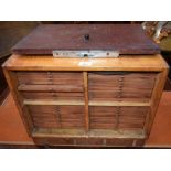 An oak and mahogany coin collector's cabinet,