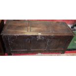 An 18th century oak three panel blanket chest, hinged top, stile feet, 53cm high,