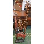 Tribal Art - a floor standing carved wooden giraffe, 123cm high; others,