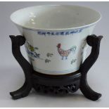 A Chinese Doucai porcelain flared cylindrical brush pot,