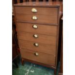 A retro mid 20th century G-Plan chest of six drawers, brass hooded cup handles,