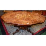 A Victorian style marquetry coffee table, serpentine top, acanthus grasped column,