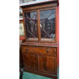 A George III mahogany secretaire bookcase, Greek key cornice above a pair of astragal glazed doors,