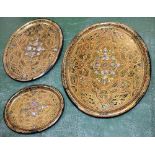 A suite of three graduating early Victorian Gothic Revival papier-mâché oval drawing-room trays,