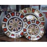 A Royal Crown Derby 1128 pattern dinner plate; others, a salad plate and side plate,