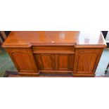 A Victorian mahogany inverted breakcentre sideboard,