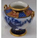 A Macintyre twin handled footed vase, flow blue, gilded panels,