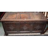 A Charles II oak three panel blanket chest, hinged top,