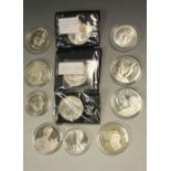 An American silver dollar, 1994, 1oz, in capsule; six others,