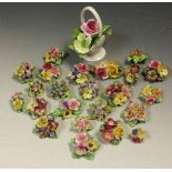 A quantity of mid 20th century ceramic floral brooches, including Dorothy Ann, Coalport,