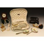 Boxes and Objects - an ornate cased four piece silver plated dressing table set, mirror,