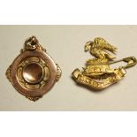 A 9ct rose gold Fords of London Sans Chancer lapel badge/brooch,