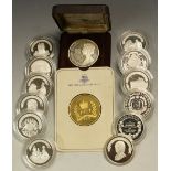 A set of twelve Charles and Diana commemorative coins, each 25g; an Elizabeth II Jubilee 1977 coin,