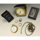 A non-reflective Ingersoll pocket watch; a Smiths pocket watch; two Zippo lighters;
