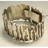 A silver modernist design bracelet,