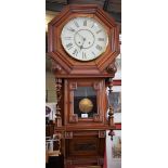 A late 19th century mahogany drop dial wall clock, enamelled dial, Roman numerals,