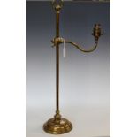 An early 20th century adjustable brass table lamp, 61.