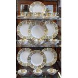 A Royal Crown Derby Green Derby Panel pattern part dinner service, including dinner plates,