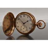 A 9ct gold hunter cased pocket watch, white enamel dial,bold Arabic numerals, minute track,