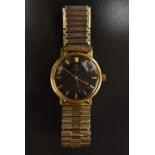 Omega - a vintage Seamaster automatic wristwatch, black dial, gilt block baton markers,